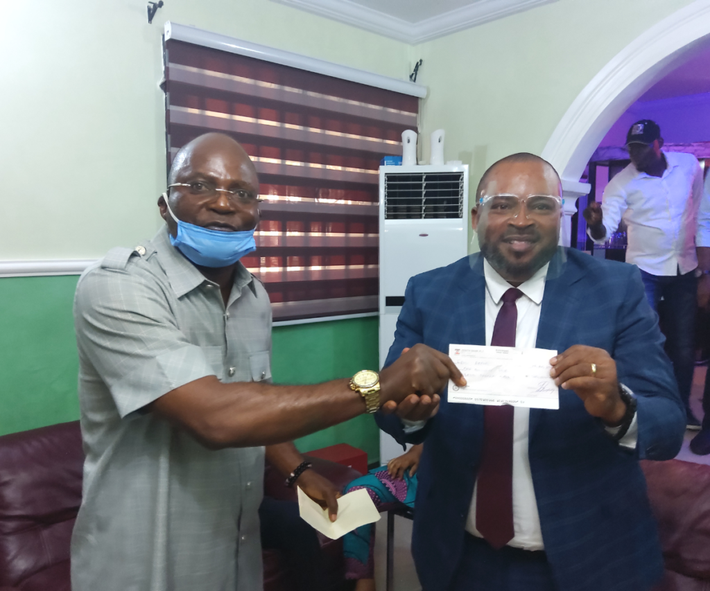 Presentation of fund support to Hon. Eric Akpan 