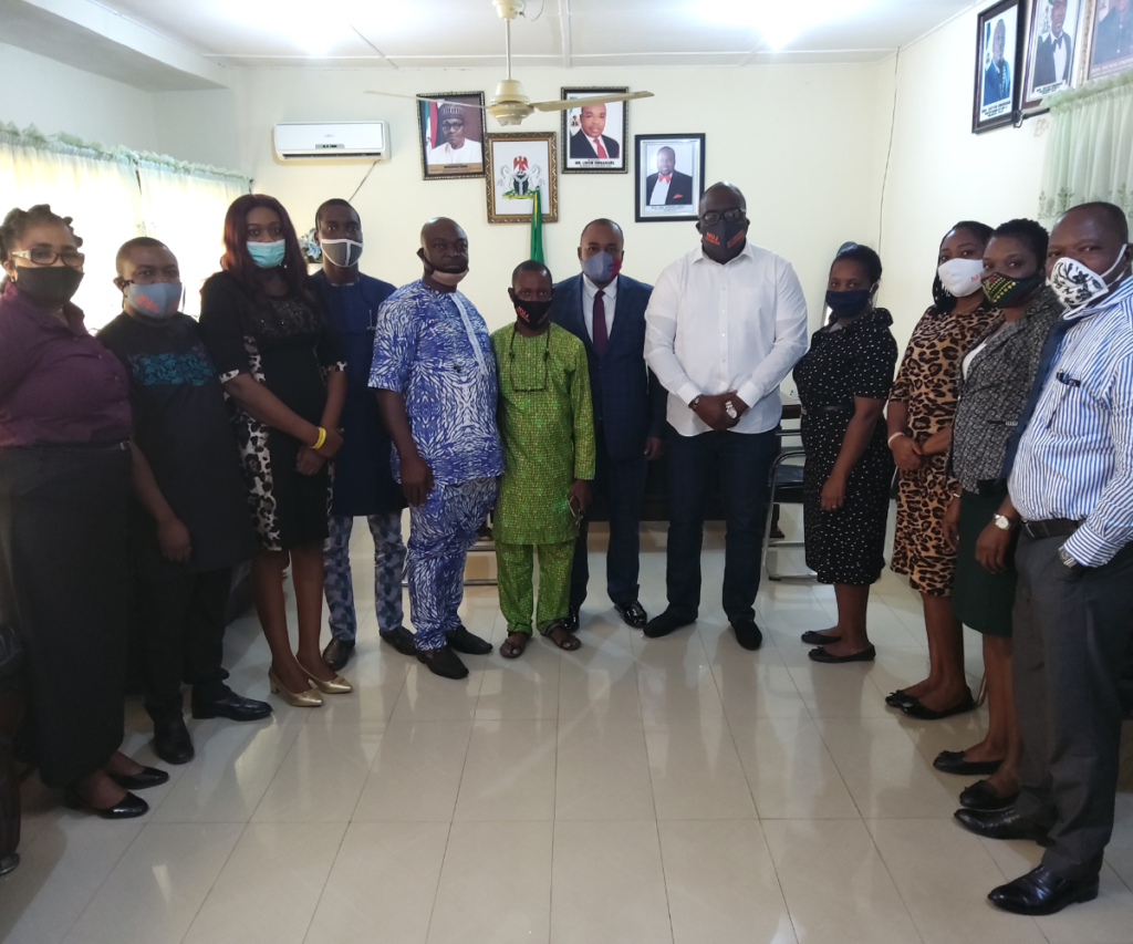 Hon. Eric Akpan flanked by Nsit Ibom Journalists 