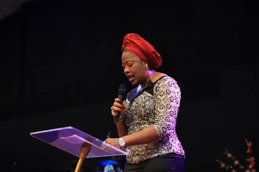 Mrs. Imaobong Bassey Albert taking a bible reading at the YPP Thanksgiving Service 